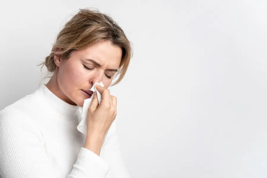 Close-up adult woman with illness symptom